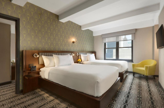 Un bon prix. Les meubles en bois en caoutchouc de chambre à coucher d'hôtel ont placé la mousse à haute densité en ligne